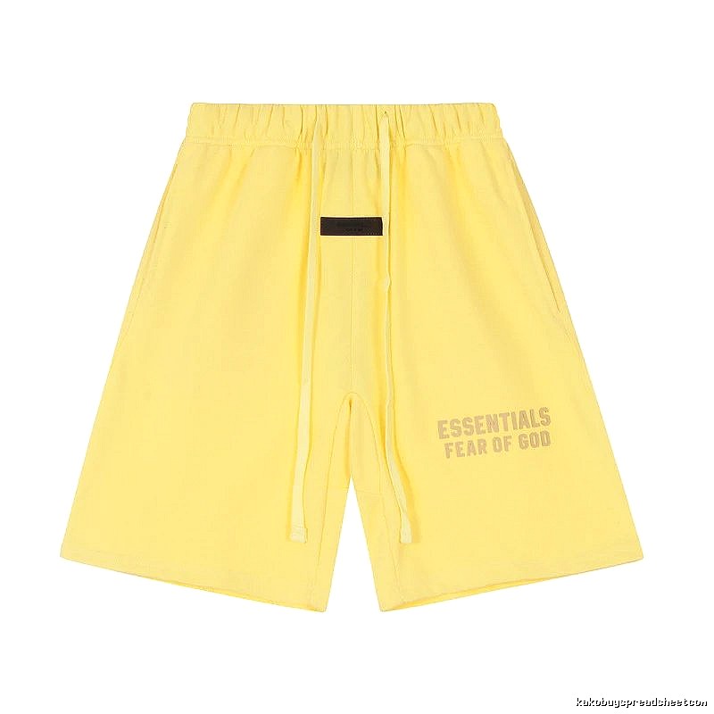 ESSENTIALS minimalist style yellow shorts