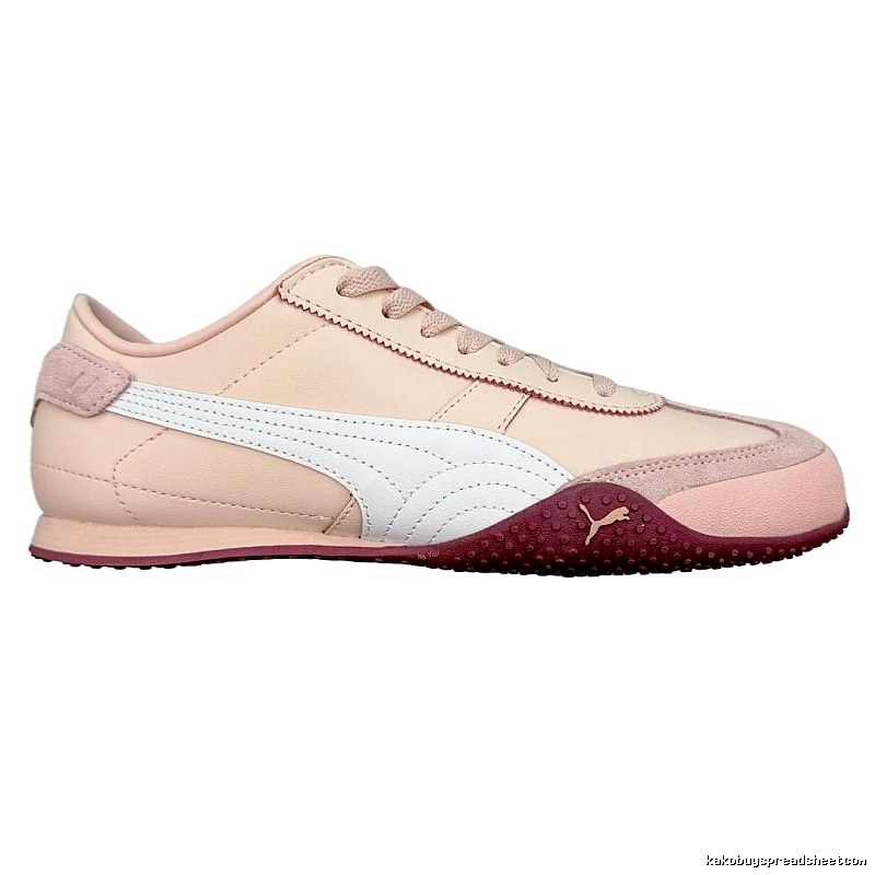 PUMA retro-style pink and white sports shoes