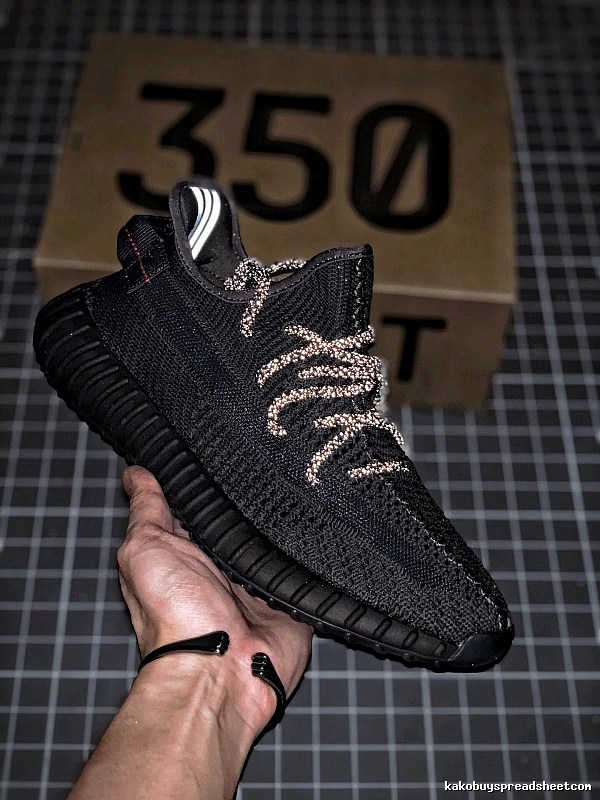 Yeezy Black Knit Sneakers Defined by Sock-Like Collar